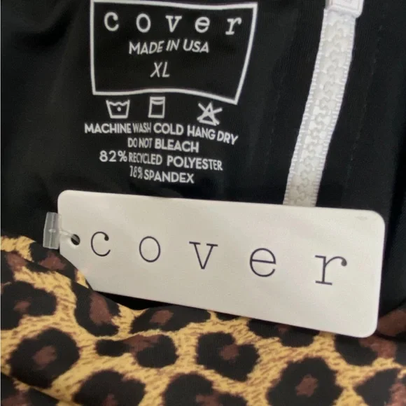 COVER. Reg $220. Leopard Print Long Sleeve Swimsuit. XL. - Picture 3 of 3